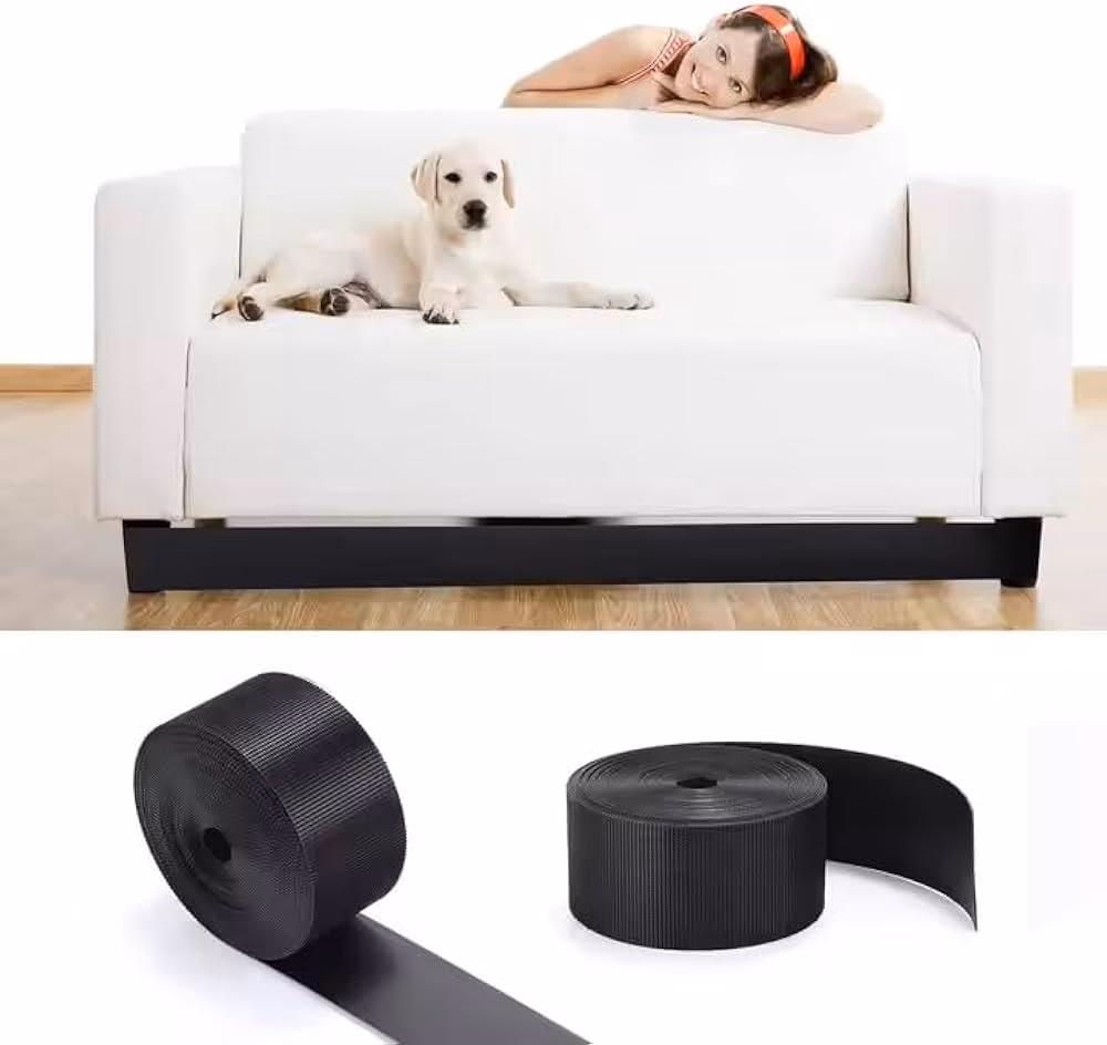 Why does my dog keep pushing his ball under the couch?