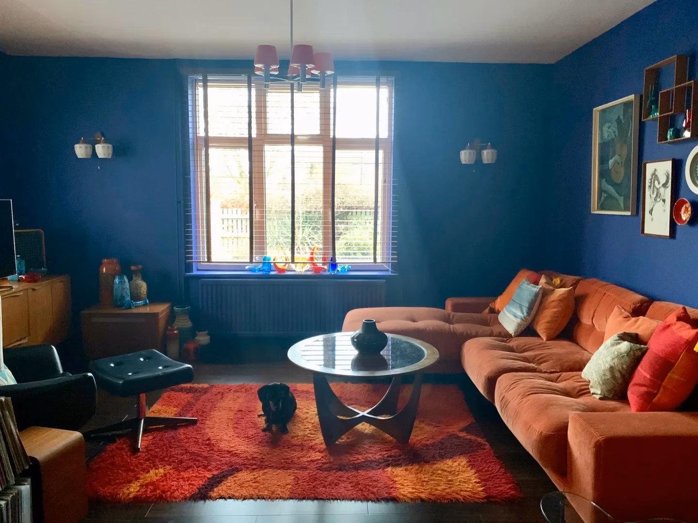 Which color sofa is best for a blue wall?