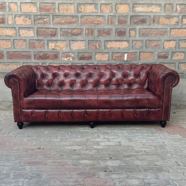What color goes with a burgundy leather sofa?