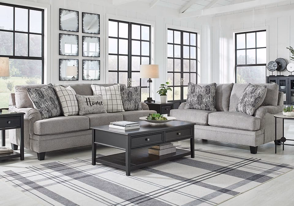 What color cushions with a charcoal sofa?