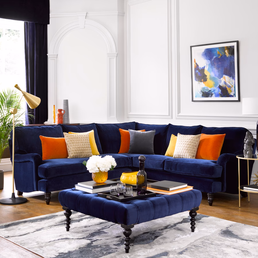 What color compliments a blue couch?