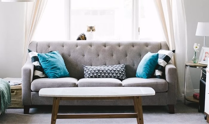 What does the sofa symbolize?