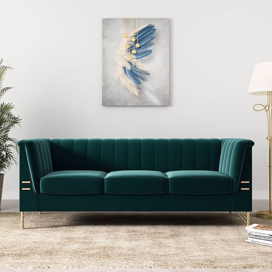 What color goes with an emerald green sofa?