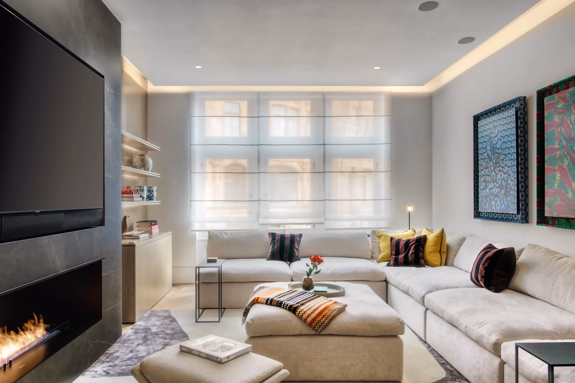 What is the sofa by the window called?