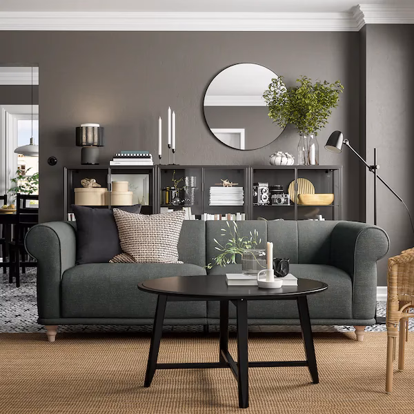 Does green go with a grey couch?