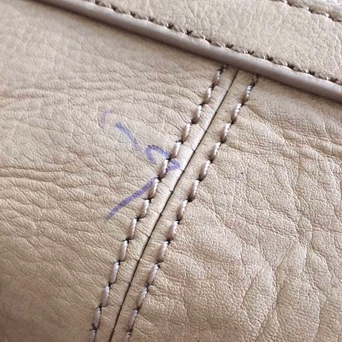 How do you get ballpoint pen off leather?