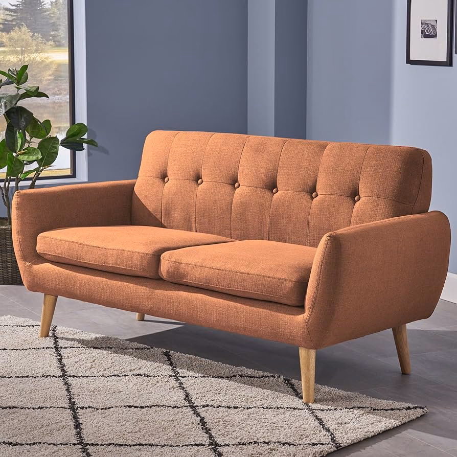 Who owns Cozey sofa?