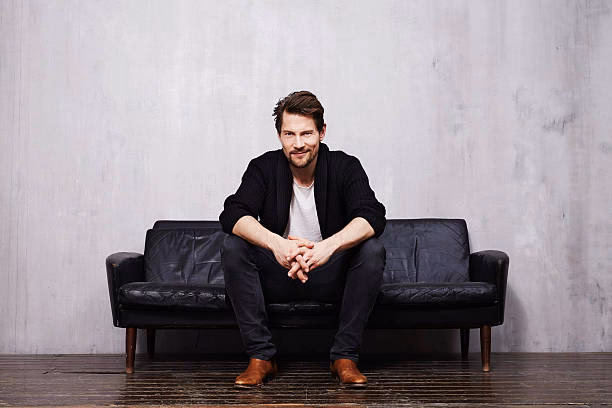 How should you sit for a portrait photo?