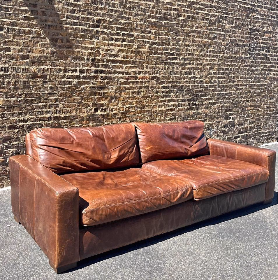 How to get scratches out of restoration hardware leather couch?