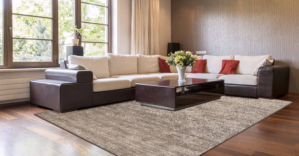 Why put carpet under a sofa?