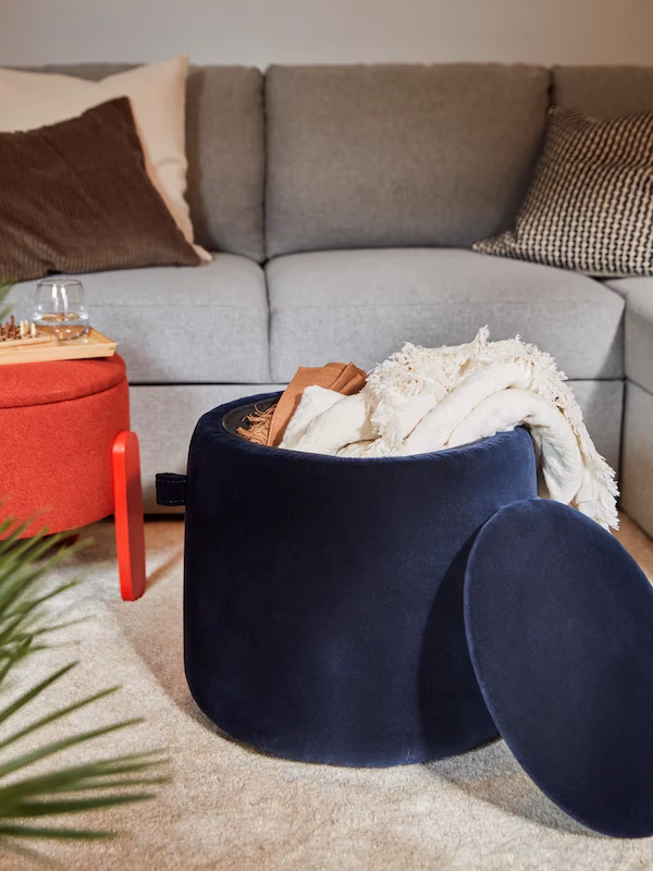 What furniture item like a low box with a soft top can be used as a footrest?