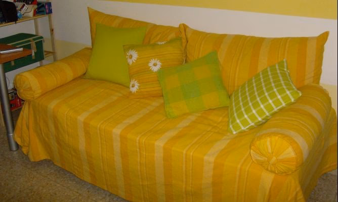 ¿Cómo hacer que una cama doble parezca más grande?